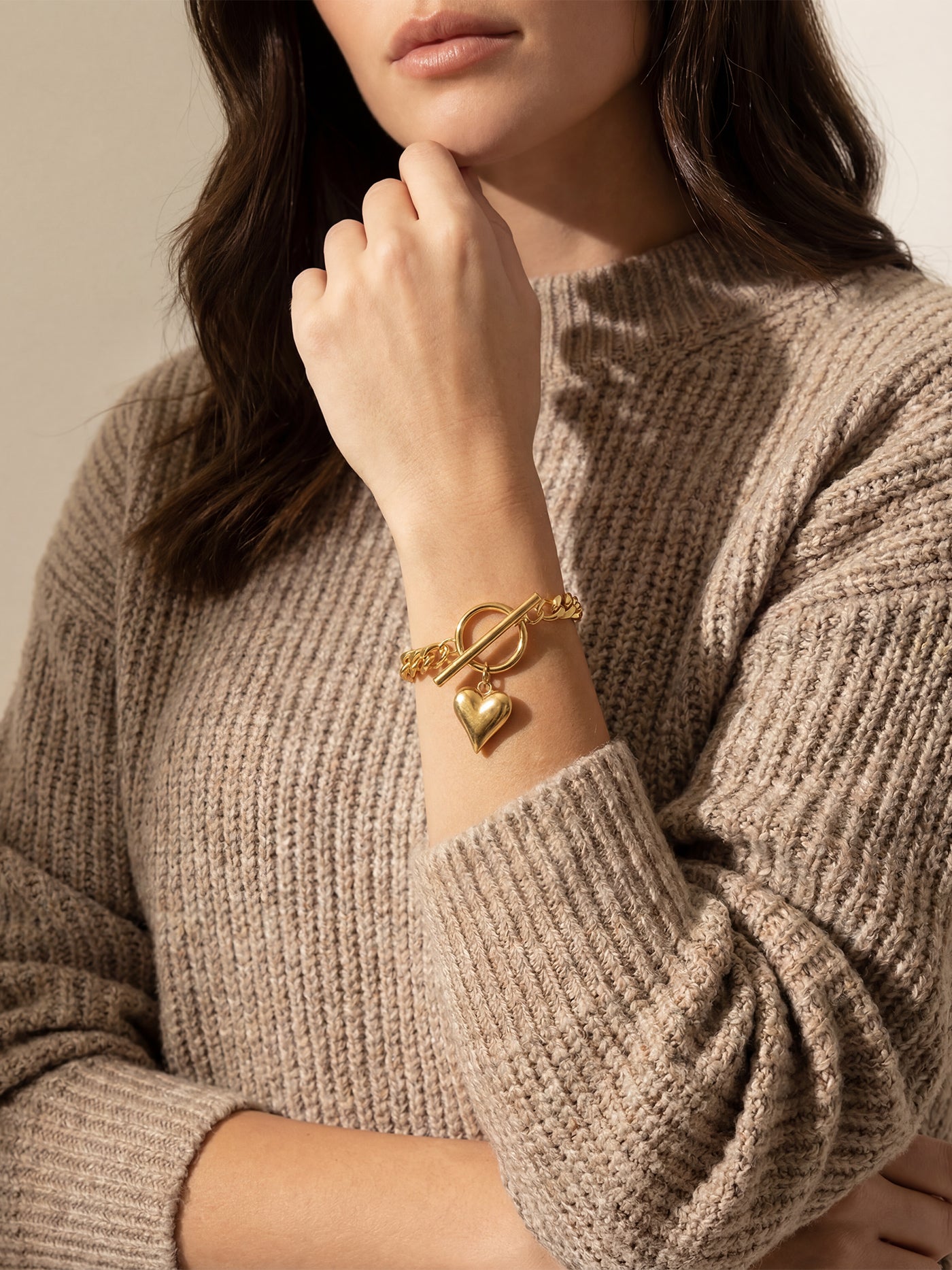 Gold coloured heart charm bracelet