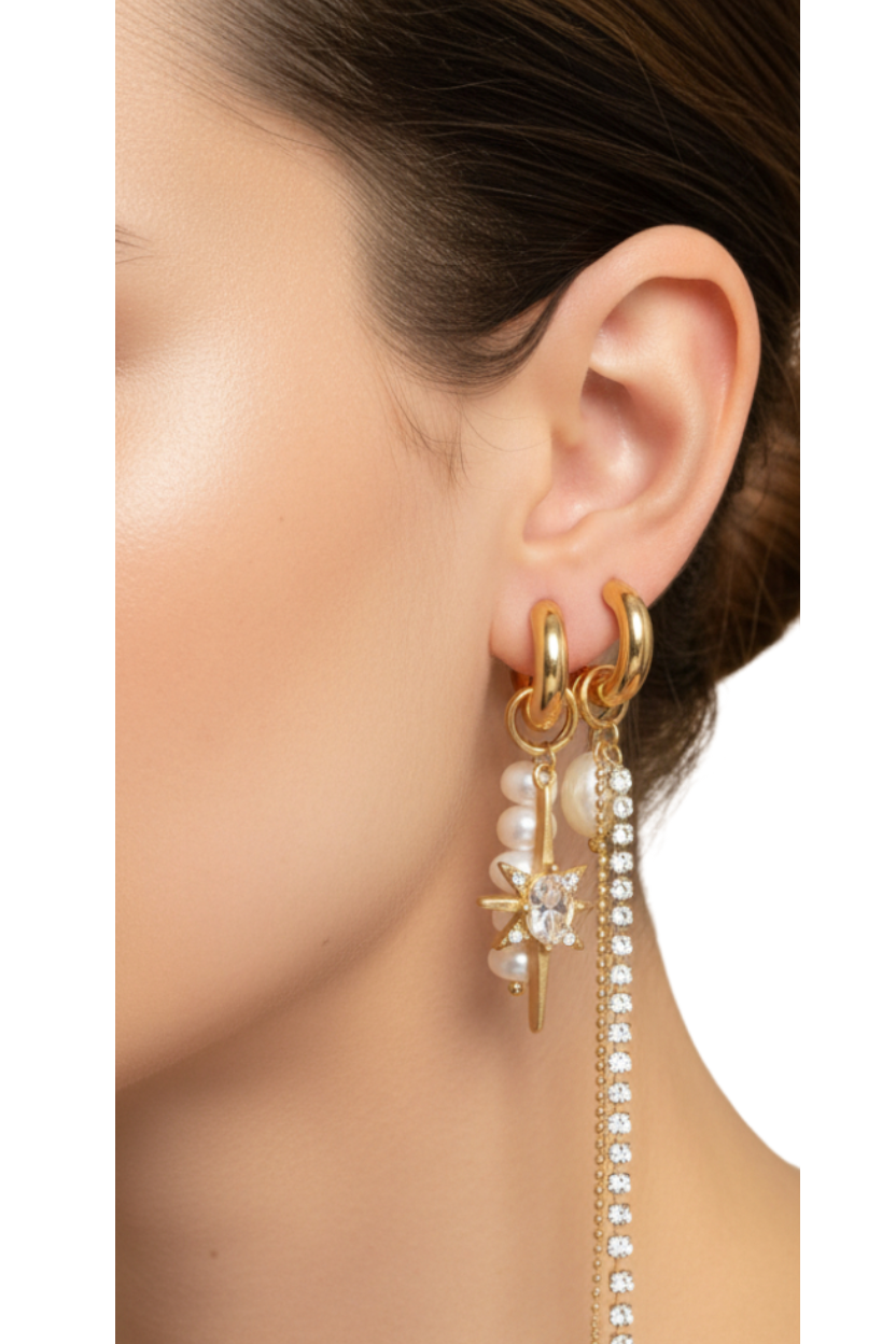 Gold coloured ODD earrings with pearl and diamante embellishments