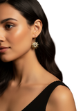Gold coloured sunburst earring with diamante details