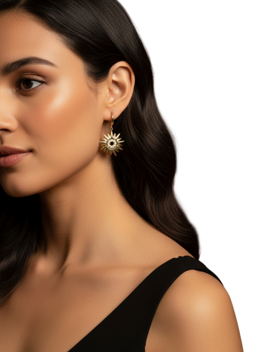 Gold coloured sunburst earring with diamante details